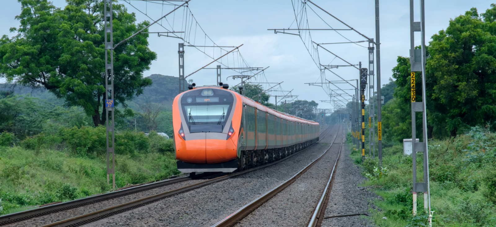 Vande Bharat Chair Car train on the track in India